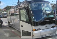 Google, Apple shuttle buses attacked by unidentified entity.