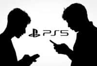 Person holding cellphone with logo of video gaming platform PlayStation Network (PSN) in front of cihp .
